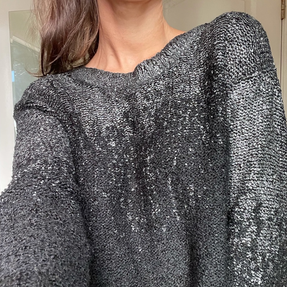 Black and metallic sweater